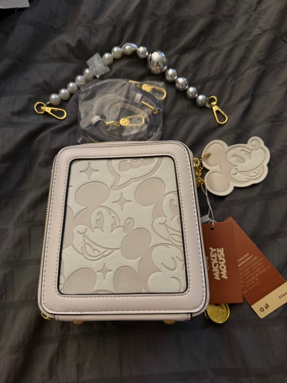 Mickey Mouse Embossed Crossbody Bag in Light cream
